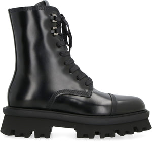 Ferragamo Combat Boots with Brushed Calfskin, Lug Sole and String Closure for Women in Black - FW23 Collection