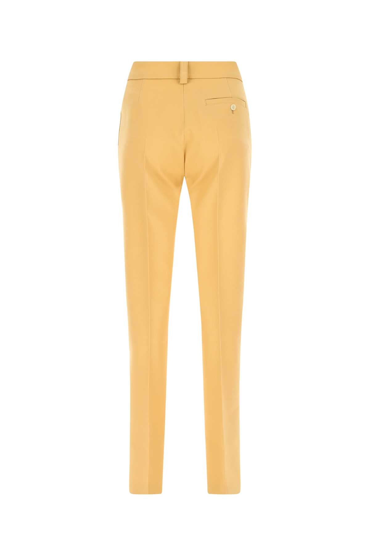 QUIRA Pastel Orange Wool Trousers for Women