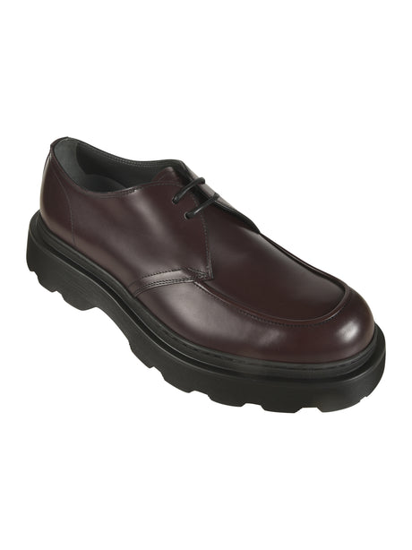 Tod's Sophisticated Flat Shoes for Men