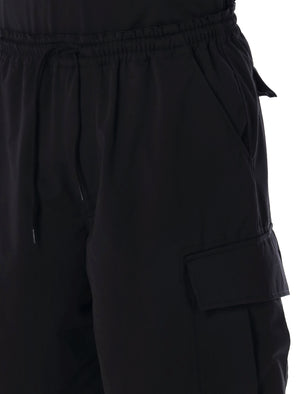 COMME DES GARÇONS HOMME PLUS Mens Cargo Shorts in Black for SS24