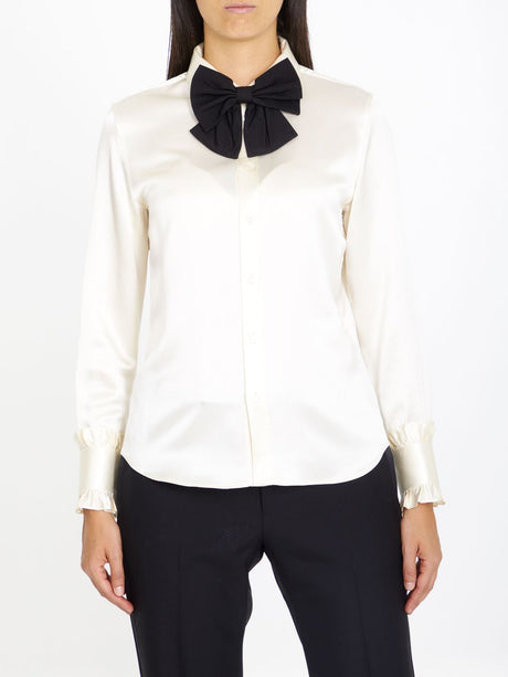 CELINE Silk Blouse with Decorative Bow and Ruffled Cuffs