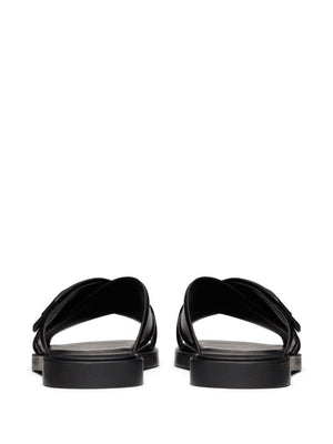 VALENTINO Signature Slide Sandals in Black Leather