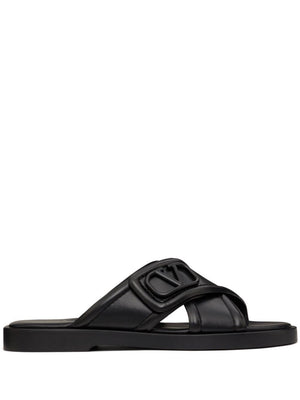 VALENTINO Signature Slide Sandals in Black Leather