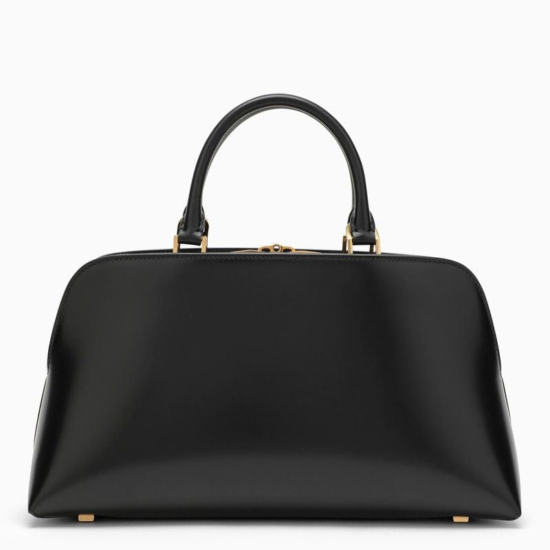 SAINT LAURENT Small Shiny Black Leather Duffle Handbag with Bronze Metal Accents and Adjustable Strap for Women