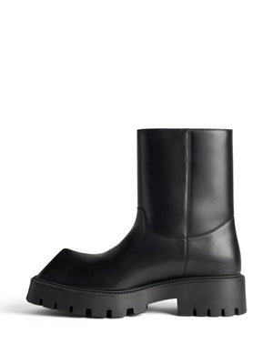 BALENCIAGA Men's Black Leather Boots with Brief-On Design and Rubber Chunky Sole