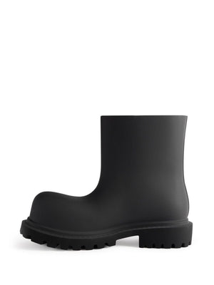 BALENCIAGA Trendy Black Boots for the Modern Man - Spring/Summer 2024 Collection