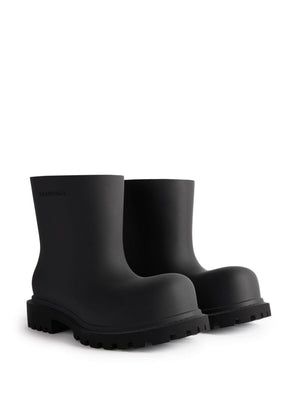 BALENCIAGA Trendy Black Boots for the Modern Man - Spring/Summer 2024 Collection