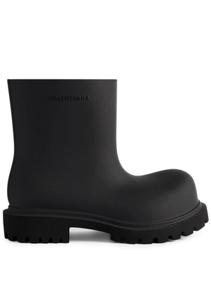 BALENCIAGA Trendy Black Boots for the Modern Man - Spring/Summer 2024 Collection