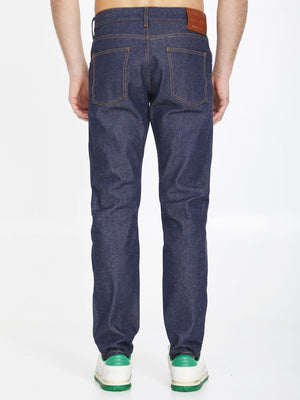 GUCCI Washed Blue Denim Jeans with Horsebit Embossed Leather Label