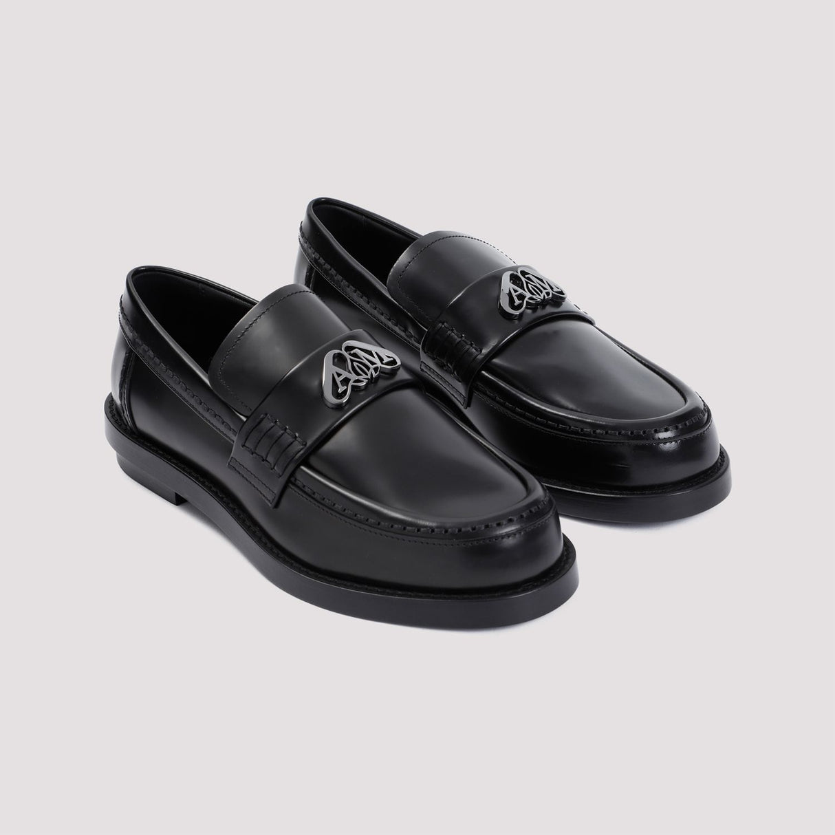 ALEXANDER MCQUEEN Sleek and Sophisticated Black Leather Loafers for Women