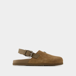 DOLCE & GABBANA Luxury Suede Leather Clogs with Signature Emblem