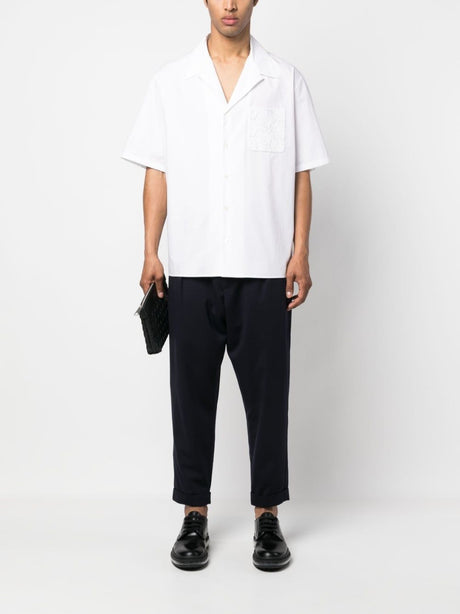 BALMAIN Embossed-Button Drawstring-Waist Trousers in Bleu Fonc for Men | SS23 Collection