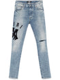 AMIRI Suede Applique Logo Skinny Jeans