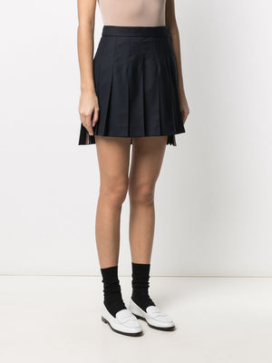 THOM BROWNE Navy Blue Pleated Skirt with RWB Stripe and High-Low Hem