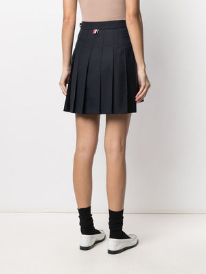 THOM BROWNE Navy Blue Pleated Skirt with RWB Stripe and High-Low Hem