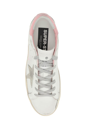 GOLDEN GOOSE Effortlessly Cool: Distressed Canvas Sneakers for Fashion-Forward Women