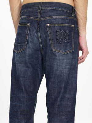 PALM ANGELS High-Waisted Monogram Jeans in Blue Cotton Denim for Men