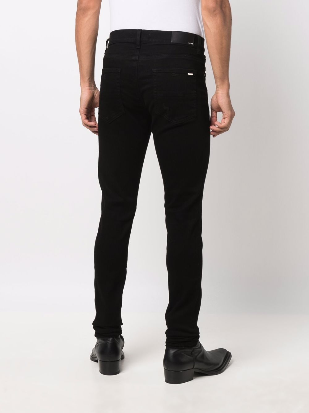 AMIRI Black Ripped Skinny Jeans for Men - SS24 Collection