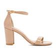 Nude Patent Leather NearlyNude Sandals for Women by Stuart Weitzman