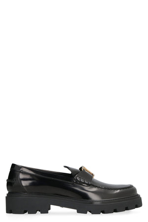 TOD'S Men's Black Leather Monogram Loafers with Ridged Sole and Gold Logo